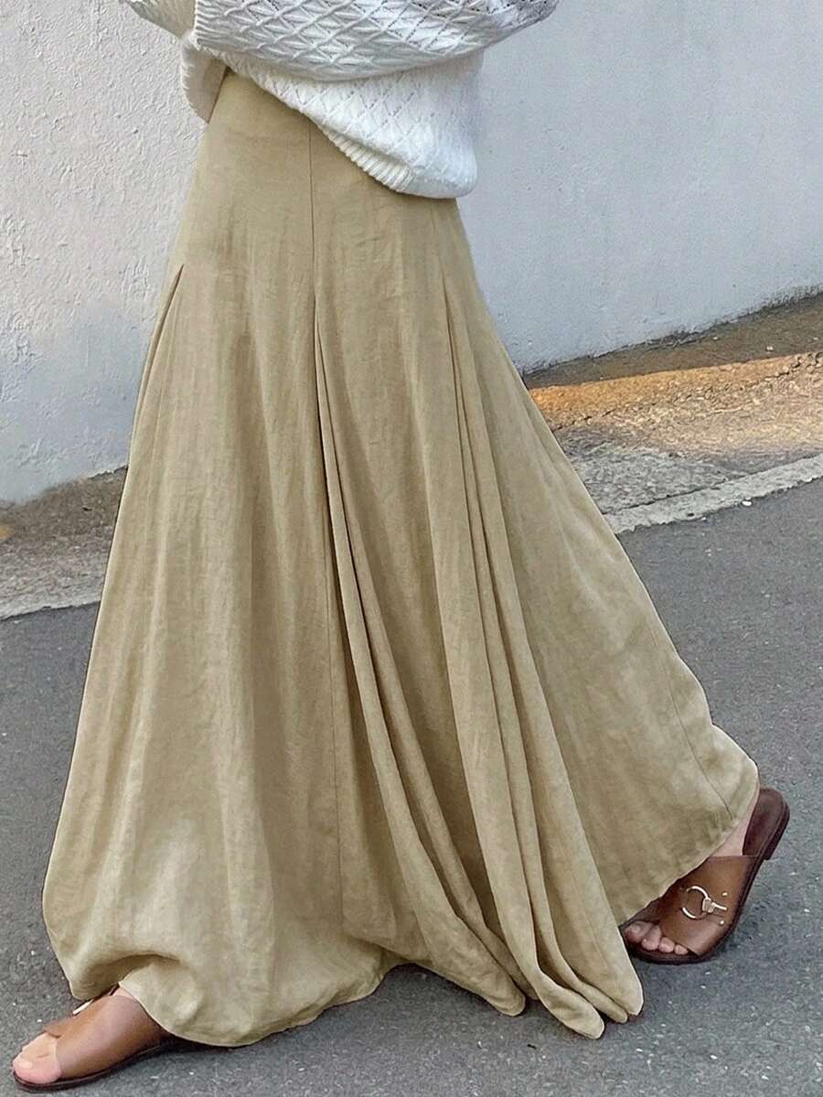 Ženska duga suknja u kišobran kroju, široka, jednobojna, elegantna