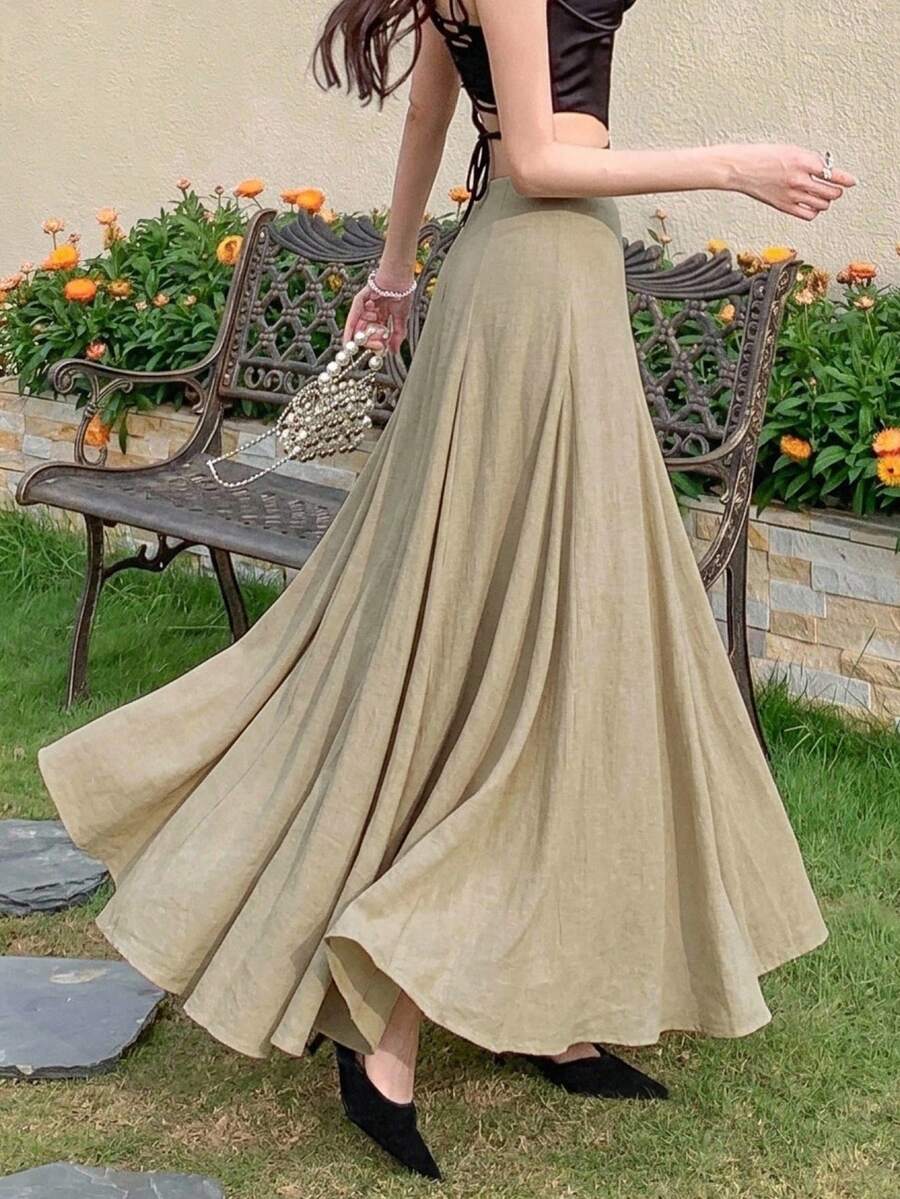 Ženska duga suknja u kišobran kroju, široka, jednobojna, elegantna