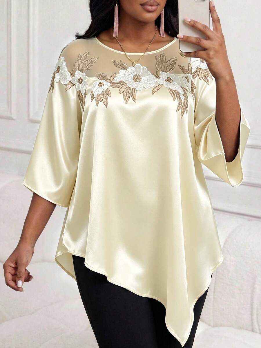 Elegantna bluza za žene plus size sa cvetnim vezom