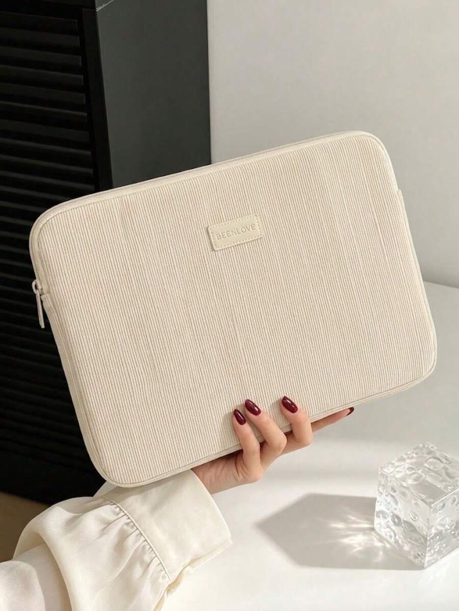 Moderna pufnasta tašna za laptop sa štepom