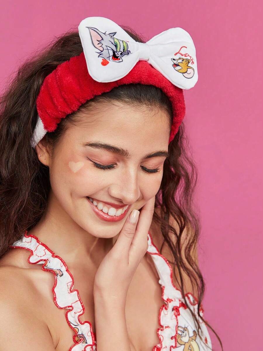 TOM & JERRY Plišana elastična traka za kosu sa mašnom i printom srca
