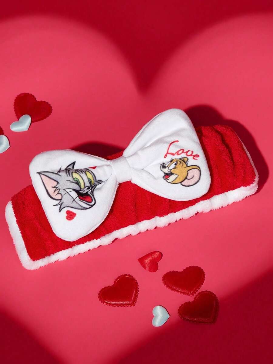 TOM & JERRY Plišana elastična traka za kosu sa mašnom i printom srca