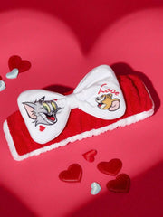 TOM & JERRY Plišana elastična traka za kosu sa mašnom i printom srca