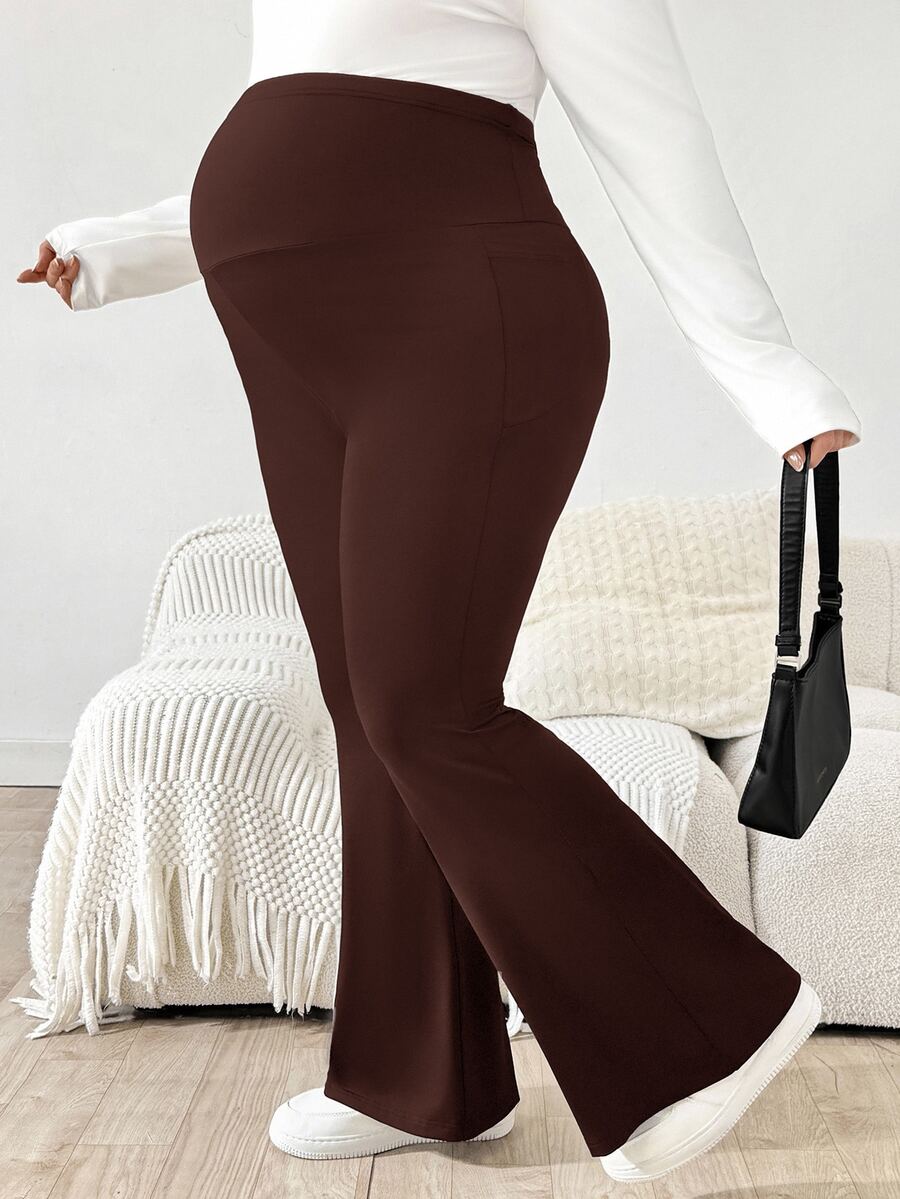 Trudničke raširene pantalone plus size jednobojne sa podesivim strukom i džepovima