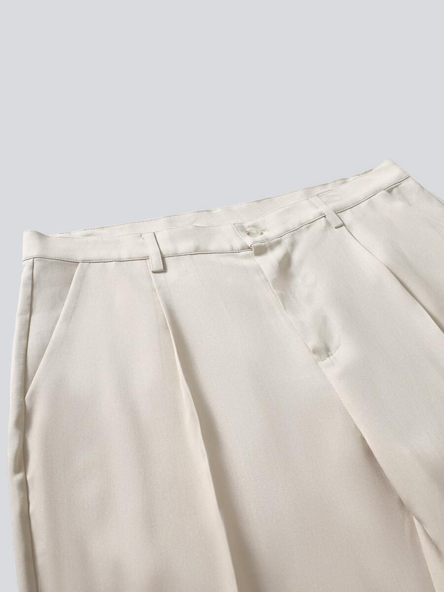 Muški poslovno-ležerni komplet  sa dugim rukavima, sako na kopčanje i ležerne pantalone sa džepovima
