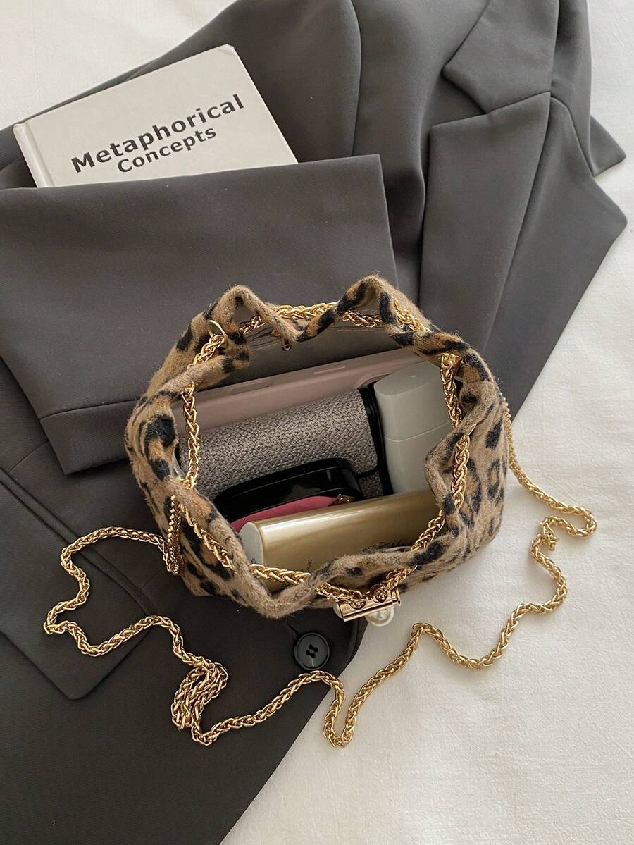 Moderna mini torba  jednobojna sa lanac kaišem