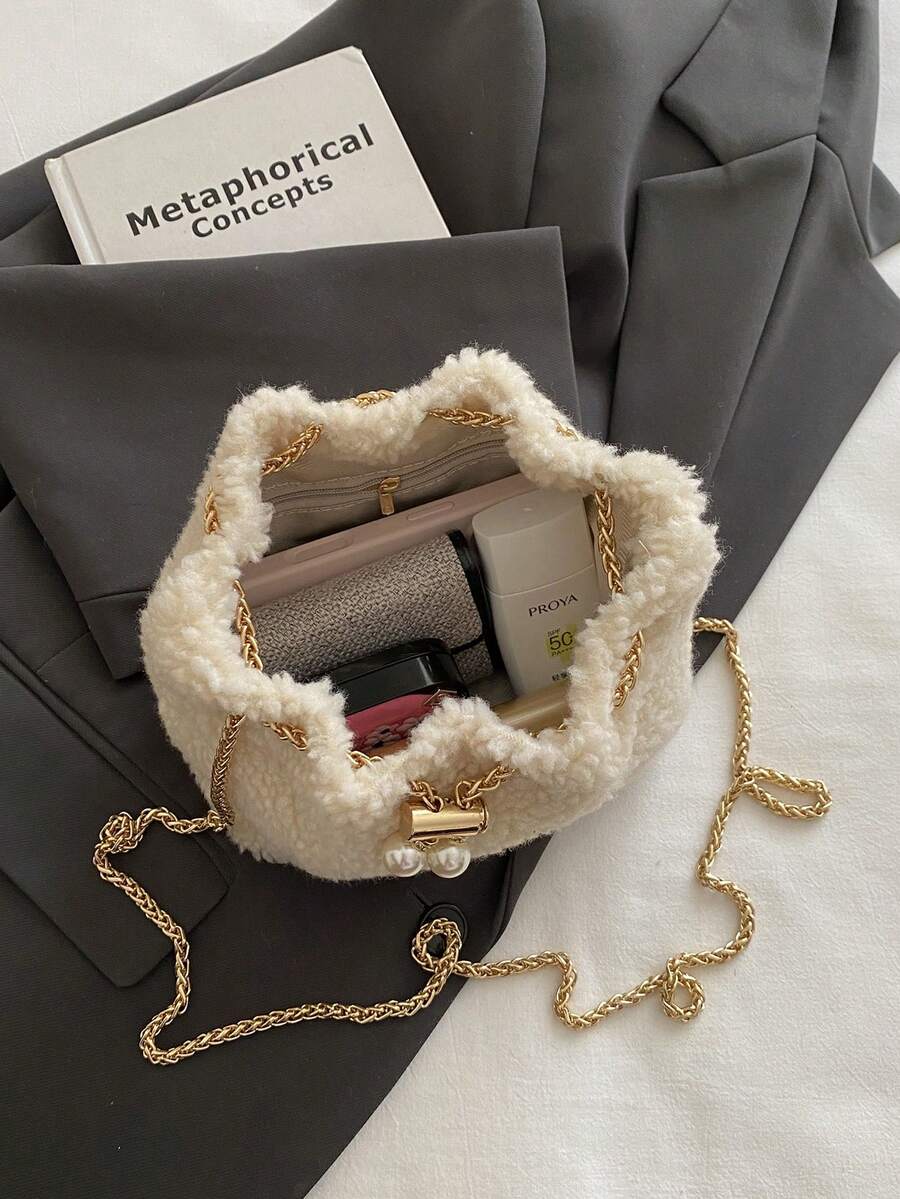 Moderna mini torba  jednobojna sa lanac kaišem