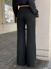 Ženske crne jednobojne duge pantalone