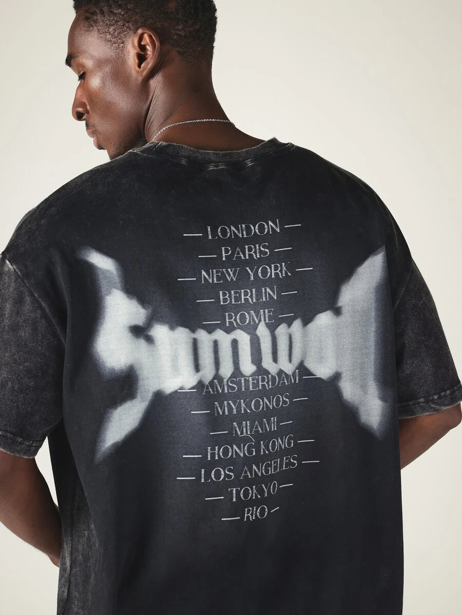 Majica oversize kroja sa acid wash efektom, grunge printom na leđima i logotipom na grudima